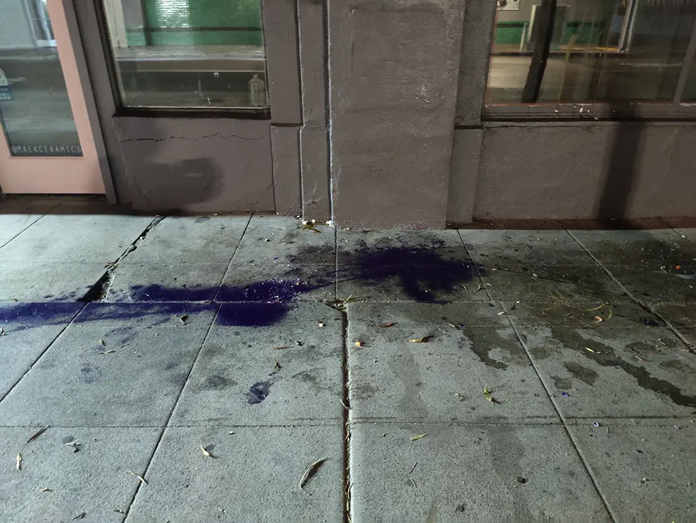 Sidewalk Paint Spill Before
