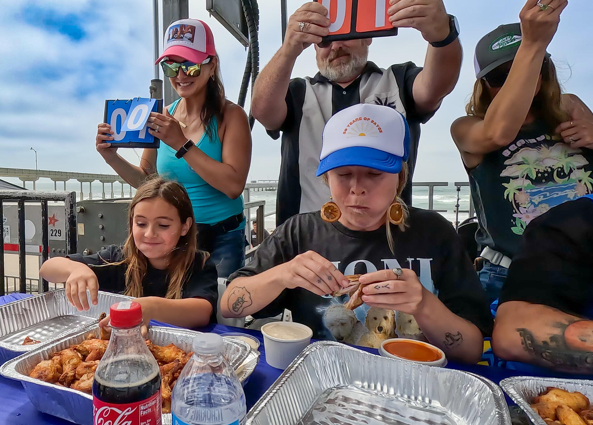 Photo of: 2024 Ocean Beach Street Fair and Chili Cook-Off - Dirty Birds Wing Eating Contest