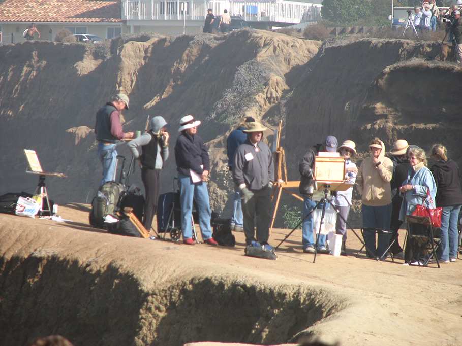 artists painting at the cliffs