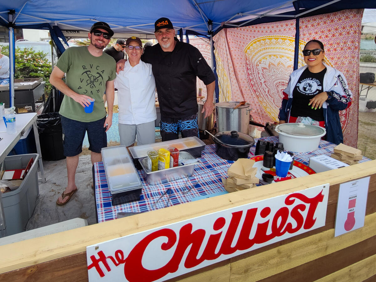 Photo of: 2023 OB Chili Cook-Off Booths & Winners - AMATEUR DIVISION - BEST BOOTH - Jason Bullard with The Chiliest